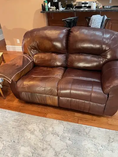 Free leather love seat., View more