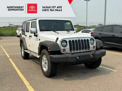 3.6L V6 engine with manual transmission - 4x4 drive for all-terrain capability - Cloth interior with...