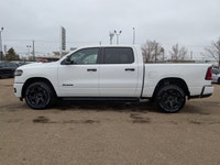 The 2026 Ram 1500 Black Express Crew Cab combines practical capability with a clean, modern design.... (image 2)