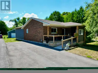 HUGE LOT - Welcome to this beautifully updated 2-bedroom, 2-bath bungalow in the heart of Stayner. S...