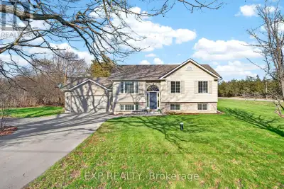 Set on a private 1 acre lot, on a dead end road, just minutes to the 401, this updated raised bungal...