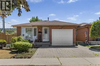 Welcome to 102 Juniper Drive, a well maintained 3-level detached backsplit situated on a massive pre...