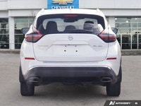 Command the urban landscape and embark on memorable journeys in this striking Pearl White Pearl Meta... (image 3)