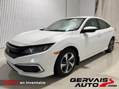 La Honda Civic LX, une berline compacte reconnue pour sa fiabilité légendaire, sa consommation de ca...