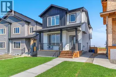 Experience the comfort and style of this custom-built home in the welcoming community of Crossfield....