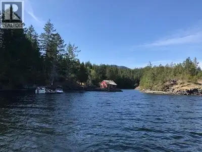 Extremely rare offering - 214 WATERFRONT acres in Green Bay, Nelson Island, with over 2,000 feet of...