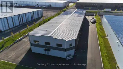 Relocate your business to 369 Griffin Way. Woodstock's Newest Light Industrial area; Unit #7 feature...