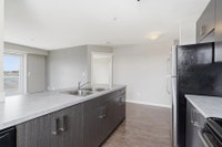 Amenities: In-suite Laundry • Security Cameras • Modern Appliances Suite & Building: One-bedroom and... (image 3)