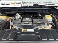 Experience the robust power and commanding presence of the 2012 Ram 3500 Laramie with its stunning d... (image 6)