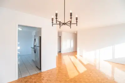 RENOVATED apt View of park. Wood floors. Fridge, stove are included. indoor parking space available....