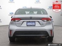 Odometer is 1478 kilometers below market average! Gray 2025 Toyota Corolla Hybrid LE AWD Continuousl... (image 3)