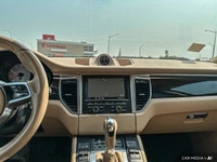 The 2015 Porsche Macan comes equipped with all-wheel drive, heated leather seats, a heated steering... (image 9)