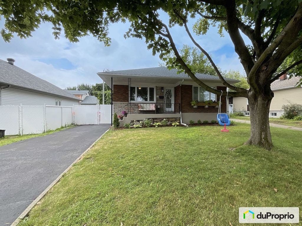$590,000 - Bungalow for sale in Chateauguay — photo 1