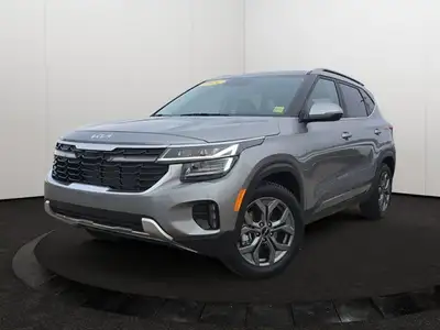 *The perfect opportunity to own a virtually-new vehicle for a used price!* This stunning Steel Grey...