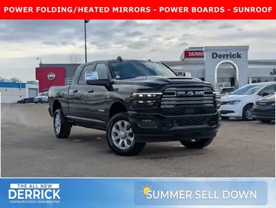 The 2026 Ram 2500 Laramie Mega Cab in Diamond Black Crystal Pearl combines heavy-duty capability wit...