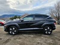 The 2024 Hyundai Kona Preferred in stunning black with an AWD drivetrain offers excellent handling o... (image 4)