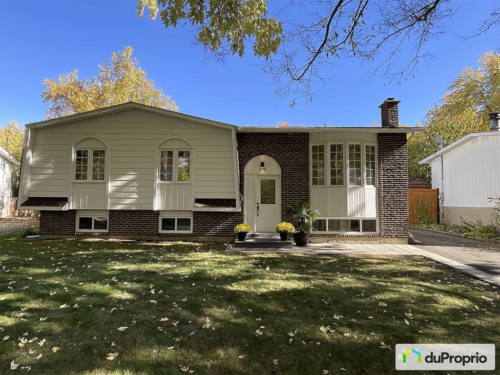 $715,000 - Bungalow for sale in Candiac — photo 1
