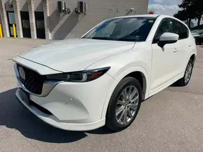 WAS: $27695 NOW: $25688 plus taxes and licensing feesSIGNATURE LUXURY VALUE! 2023 MAZDA CX-5 SIGNATU...