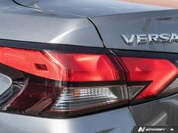 Navigate cityscapes with confidence in this sophisticated former daily rental 2024 Nissan Versa SV.... (image 7)