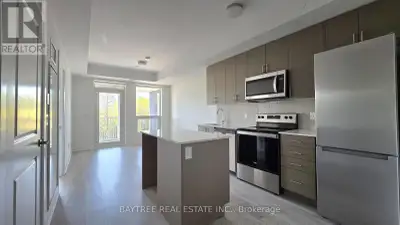 Stunning Brand New 1 Bed Condo with Island Never Lived In! Welcome to this beautifully upgraded, mod...