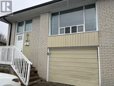 Beautiful 3 bedroom / 2 bath main floor unit with separate entrance. Spacious, open living space wit...