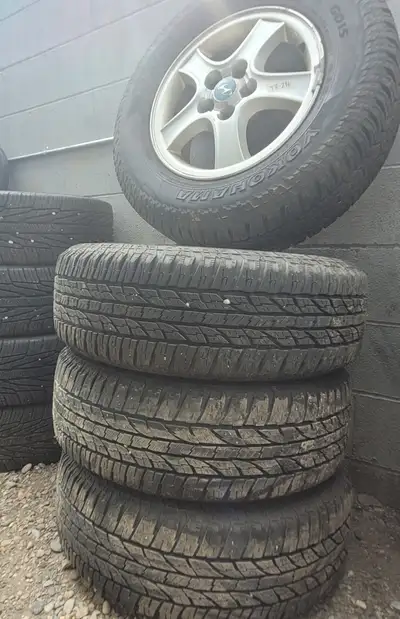 TR-296 Yokohama Geolandar A/T 225/70R16 Tires on Rims Pulled from a 2004 Hyundai Santa Fe, the rims...