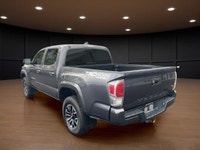 The 2023 Toyota Tacoma TRD Sport V6 in stunning gray is ready to tackle any terrain with its robust... (image 7)