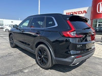 Experience the refined luxury and efficiency of this 2025 Honda CR-V Hybrid Touring, boasting a slee... (image 6)