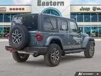 This Jeep Wrangler has a trusty Regular Unleaded V-6 3.6 L/220 engine powering this Automatic transm... (image 4)