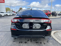 Experience the thrill of the 2025 Honda Civic Hatchback Sport, boasting a sleek Crystal Black Pearl... (image 5)