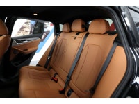 2025 BMW X4 xDrive30i 2.0L I4 DOHC AWD 8-Speed Automatic EXTERIOR - BLACK SAPPHIRE METALLIC INTERIOR... (image 9)