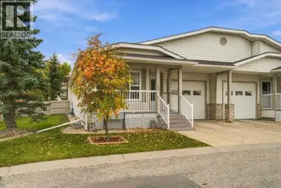 Welcome to 101! This fully updated 5 bedroom, 3 full bathroom half-duplex bungalow with an attached...