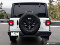 Conquer any terrain with this 2024 Jeep Wrangler Sport, boasting a powerful 2.0L turbocharged engine... (image 3)