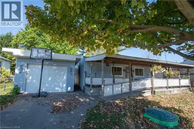 Discover the possibilities with this 2-bedroom, 1.5-bath bungalow, ideally located just moments from...