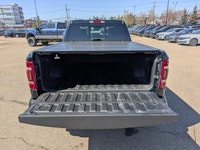 This pre-owned 2020 Ram 1500 Limited Crew Cab is finished in Diamond Black Crystal Pearl with a refi... (image 5)