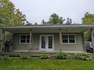 Located directly on the Bras'Dor Lake 2 bedroom cottage with private beach access. Fully furnished t...