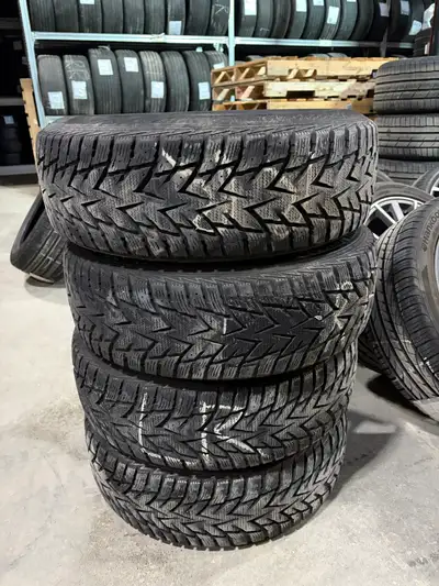 TIRES Brand: Nexen Winguard Winspike Size: 235/65R17 Speed Rating: 108T Tread: 8/32nds DOT 20 TAG#14...