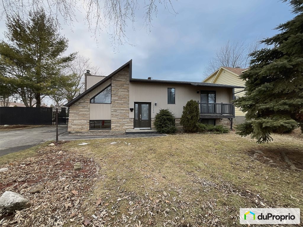 $569,000 - Bungalow for sale in Ste-Catherine — photo 1