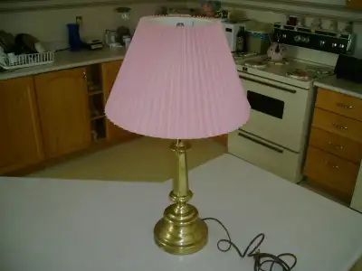 Selling a brass lamp. Working great. 25’’ high. Asking $15. for it. Smoke free, pet free home. Sorry...