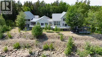 Welcome to 72 Cottage Road, Flowers Cove: A Serene Lakeside Retreat. Nestled on the picturesque shor...