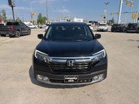 2019 Honda Ridgeline Touring AWD – Luxury, Capability & Reliability Loeppky Auto Sales is proud to o... (image 8)