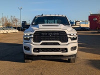 The 2026 Ram 2500 Laramie Crew Cab Night Edition in Bright White combines aggressive style, heavy-du... (image 9)