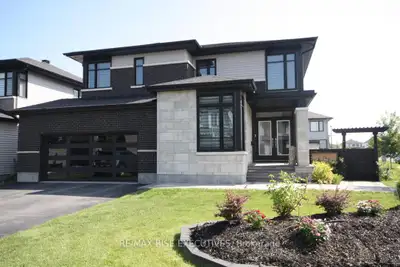 Sitting on a fully-fenced premium corner lot, this bright modern 2-storey home has 9' ceilings on th...