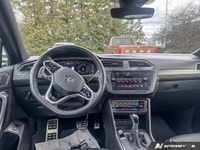 This Volkswagen Tiguan boasts a Intercooled Turbo Regular Unleaded I-4 2.0 L/121 engine powering thi... (image 9)