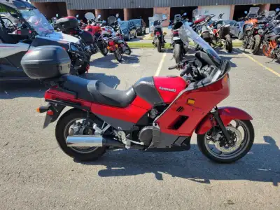 The motorcycle runs well but needs tires and brakes to pass a safety. Side-cases included (not shown...