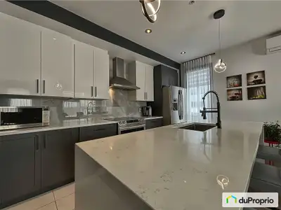Magnifique condo moderne situé dans le projet LUXXCITÉ, dans le secteur du Domaine Vert-Nord à Mirab...