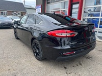 HERE IS A NICE CLEAN ACCIDENT FREE FORD SEDAN FOR YOU IT LOOKS AND DRIVES GREAT AND SOLD CERTIFIED C... (image 5)