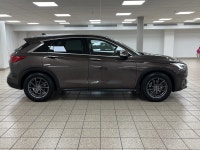 "I didnt expect an SUV to feel this composed and artful," says Maya R., a recent QX50 owner. "Every... (image 6)