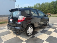 A practical subcompact hatchback with excellent fuel efficiency, easy maneuverability, and a surpris... (image 3)