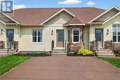BEAUTIFUL ONE-LEVEL 2 PLUS 1 BEDROOMS CONDO-MOVE-IN READY & IMMACULATELY MAINTAINED IN ONE OF THE BE...